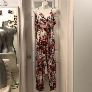 Floral low cut open leg jumpsuit